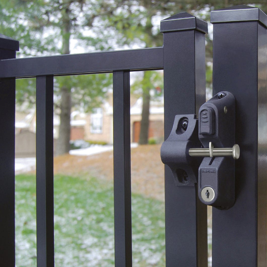Locking gravity latch with two-sided key entry / push button